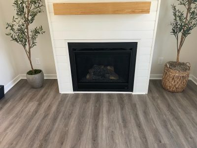 Simple Fireplace with Shiplap and Wood Mantel